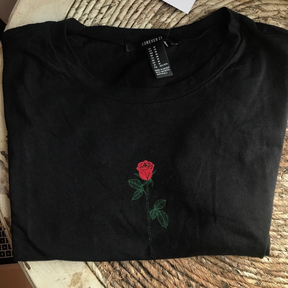 Black top with rose design